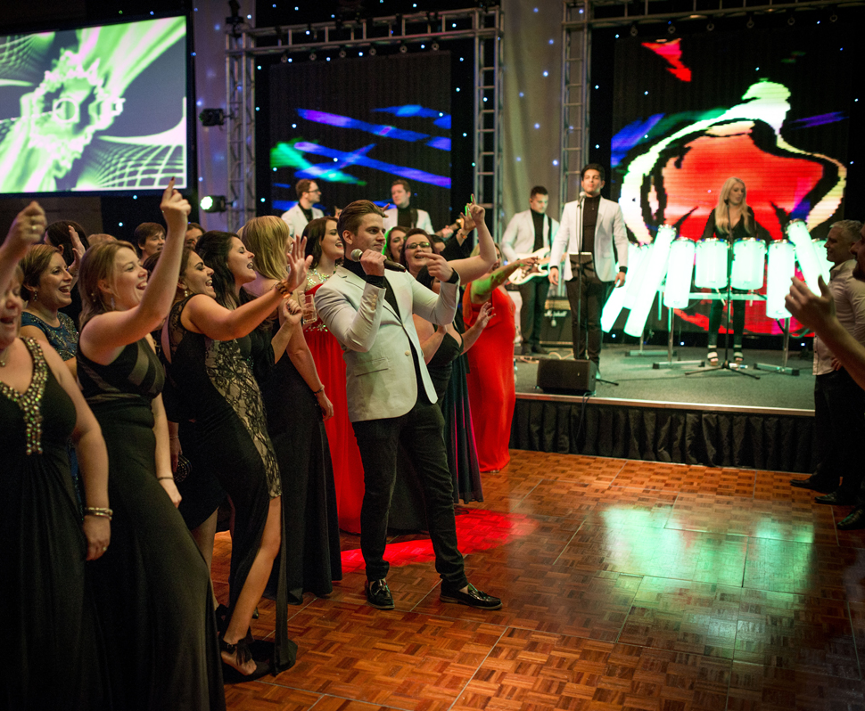 Live karaoke band performing at a corporate Christmas party